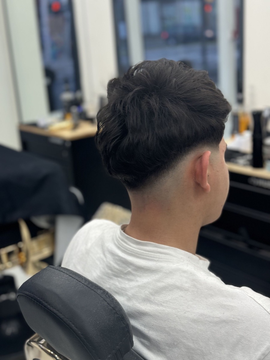 Modern haircut styling at Ibra Barbershop